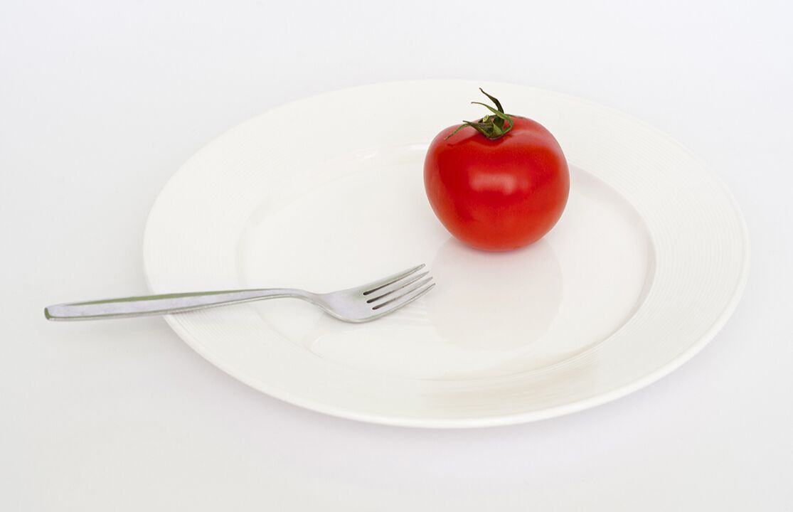 tomate cun garfo nun prato